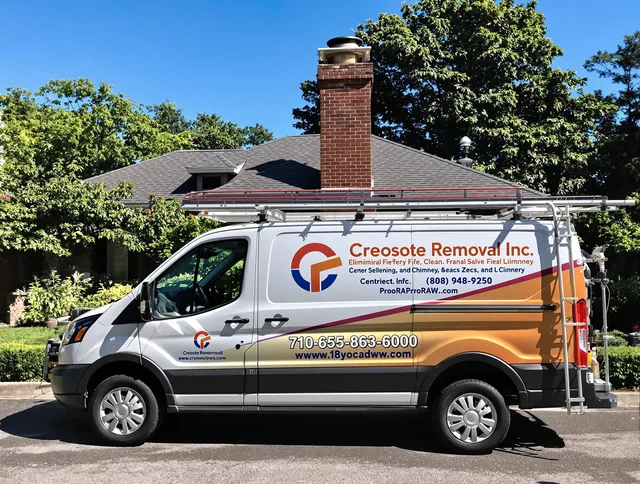 Cornelius Chimney Sweep technician removing creosote safely in Cornelius, NC